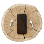 iphone mobile phone, smartphone, touch screen, make a phone call, communication, technology, mobile, cellular, headphones, tree trunk, wood, isolated, cut out